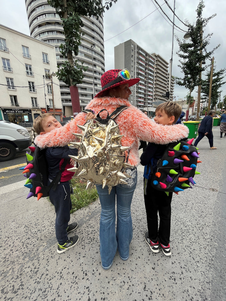 Madpax Fan with Grandsons Wearing Spike Backpacks | Madpax