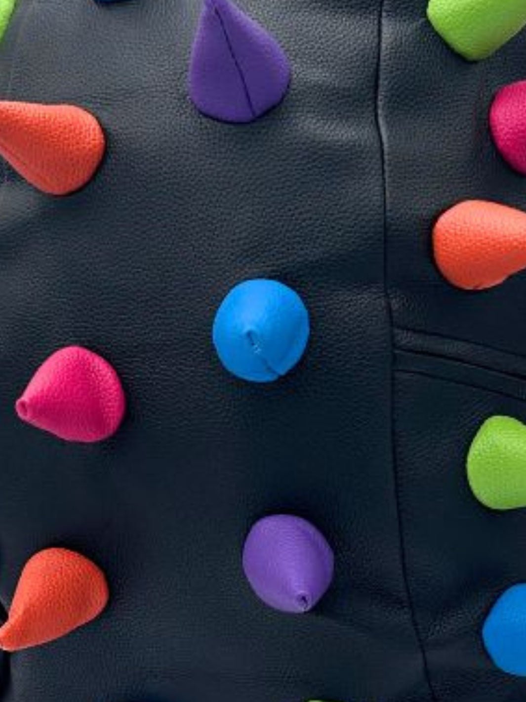 Up Close View of Abracadabra Colorful Backpack with Spikes | Madpax